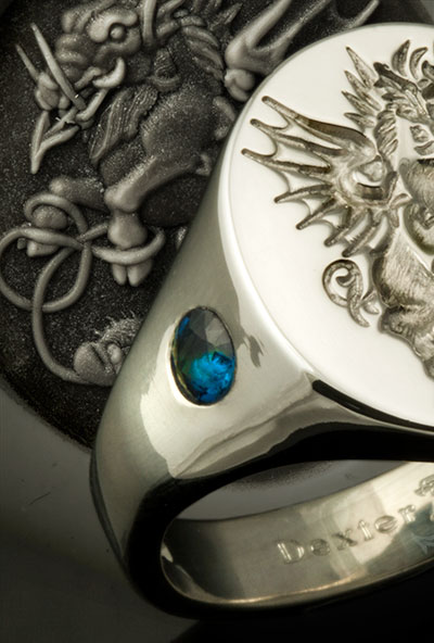 Crest Ring Set With Large Impact Sapphires in the Shoulders