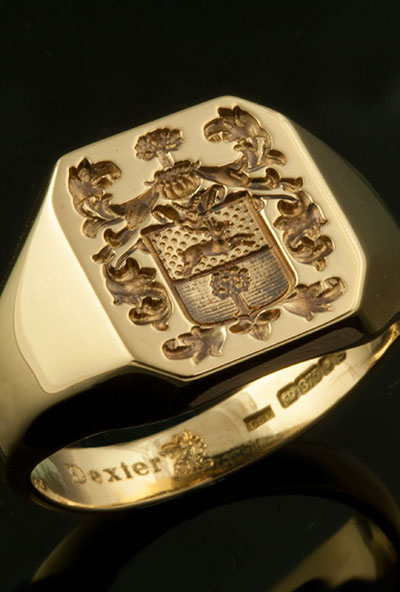 Bespoke coat of arms on an ocagonal gold signet ring