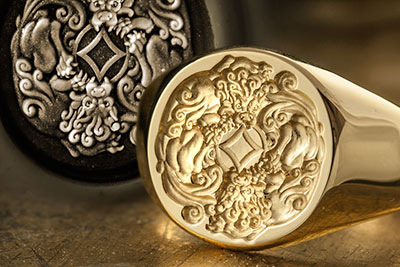 signet ring with two chinese dragons entwined