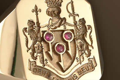 Rubies Designed ino this Bespoke Coat of Arms Ring