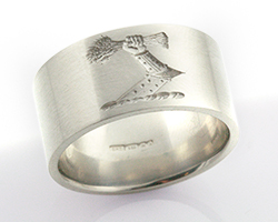 Large wedding band with crest