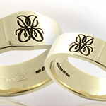 matching mini cigar style band and plain band