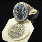 Sardonyx signet ring engraved with a traditional family coat of arms