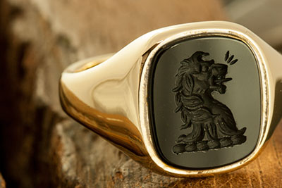 Onyx Cushion Signet with Lion Head Erased Crest