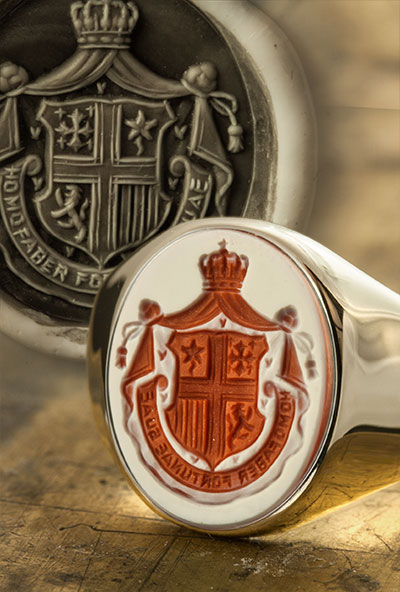 Red sardonyx ring coat-of-arms cloak & motto