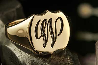 Unusual shape signet ring with script initial