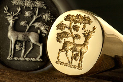 Stag standing under tree guardant heraldic crest signet ring