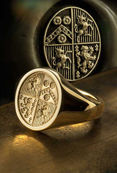 Oval lozenge heraldic shield quartered ladies signet ring